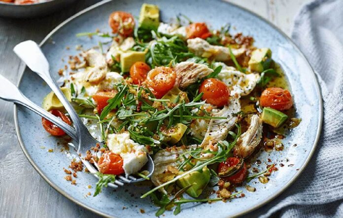 Chicken and mozzarella salad with warm tomato dressing