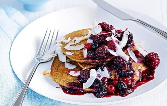 Healthy banana pancakes with berry compote