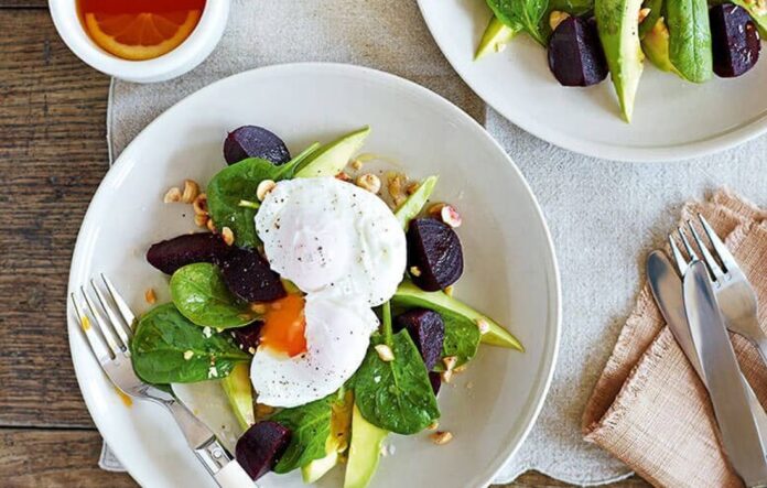 Poached eggs with avocado, beetroot and spinach