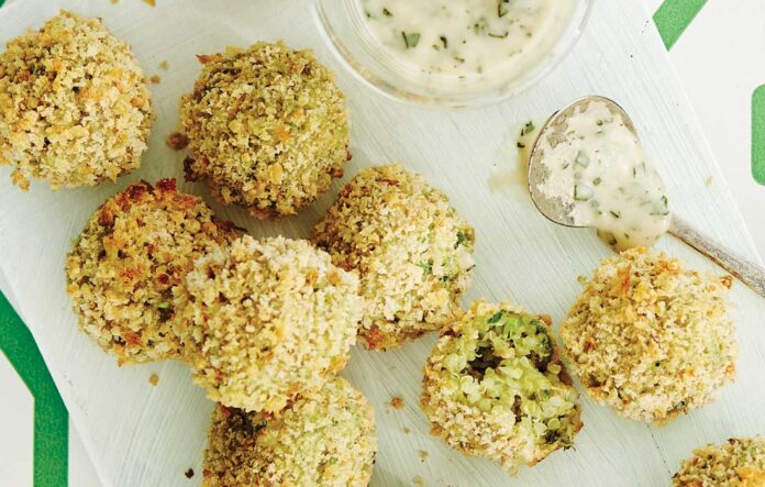 Baked quinoa arancini with creamy basil sauce