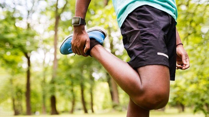 a man stretching before a run